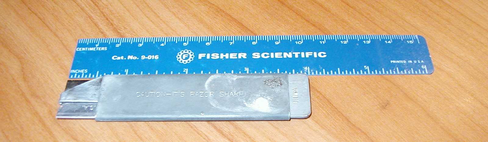 A box cutter compared to a 6" ruler.