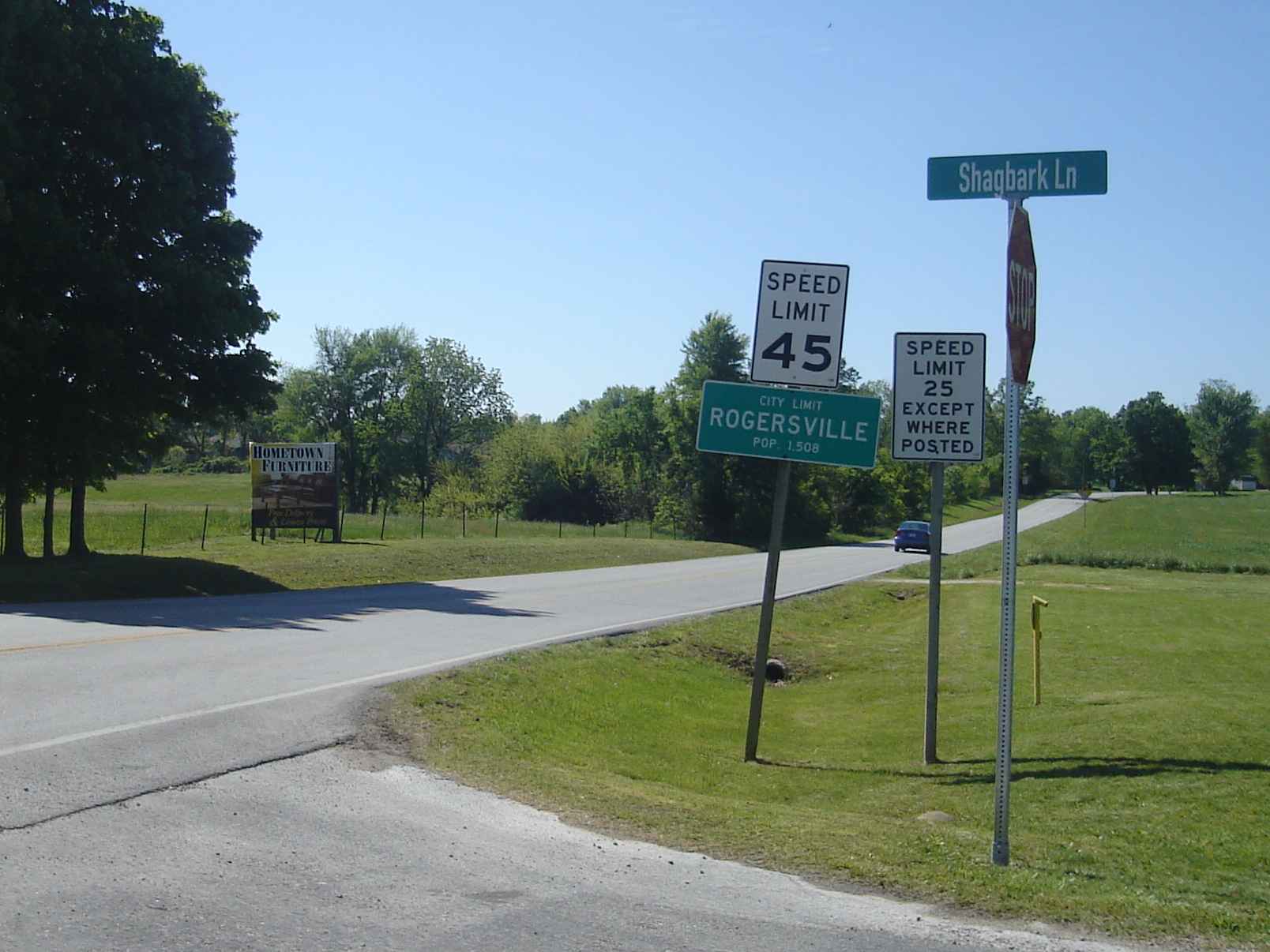 Rogerville city limit sign, population 1508